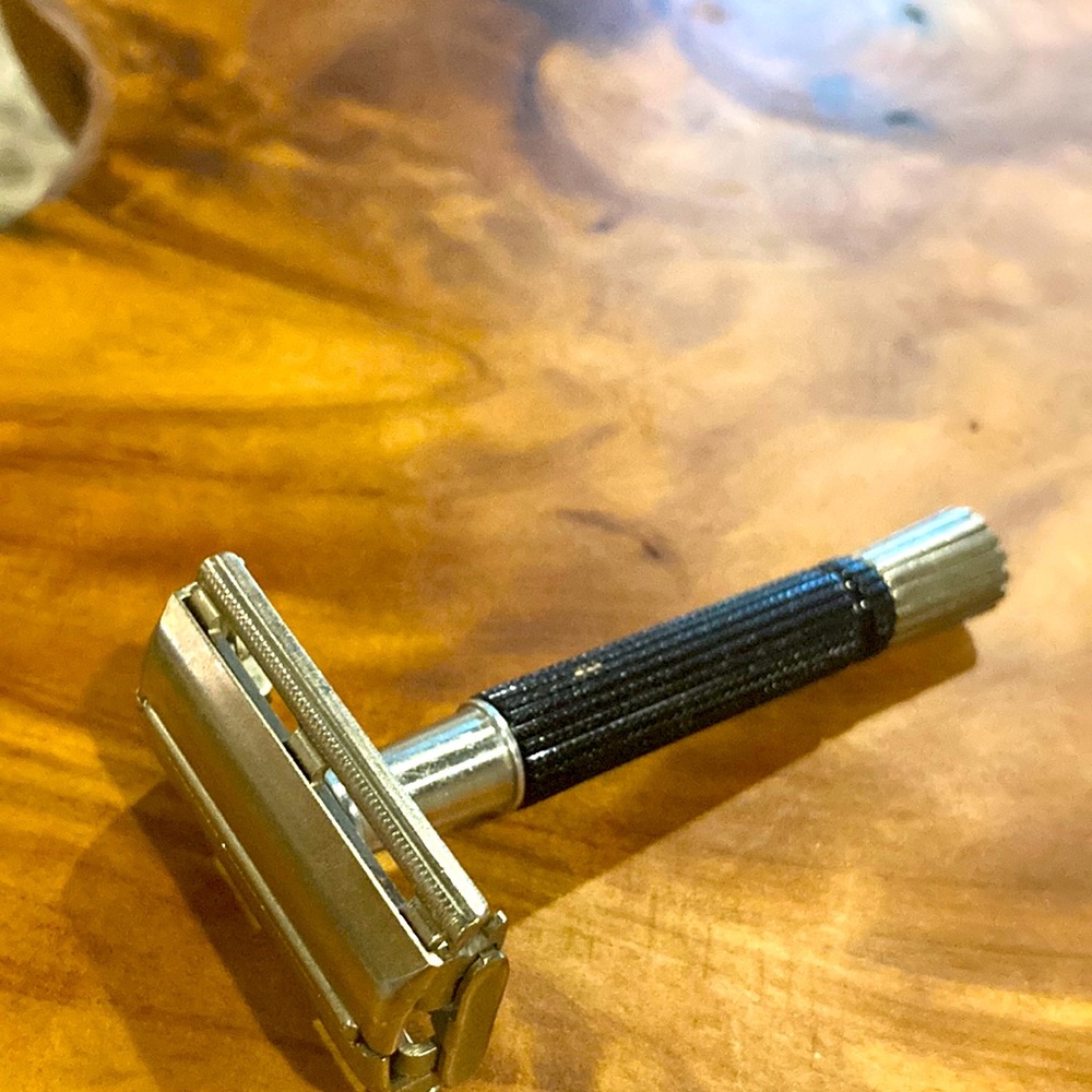 Schick Safety Razor. Vintage 1969 black celluloid or lucite handle.
